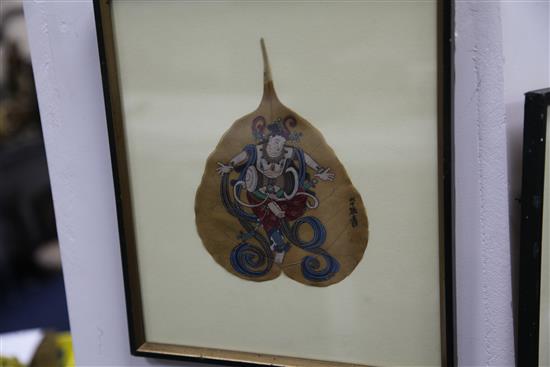 A pair of Chinese paintings on leaves, 20th century, bearing seals for Zhang Daqian, 19cm & 17cm, mounted, framed and glazed